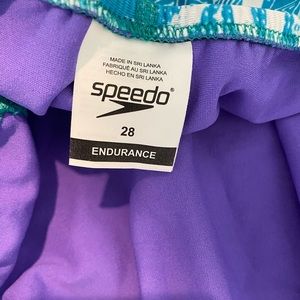 Endurance Speedo bathing suit. Size 28. Open back. Blue and white.